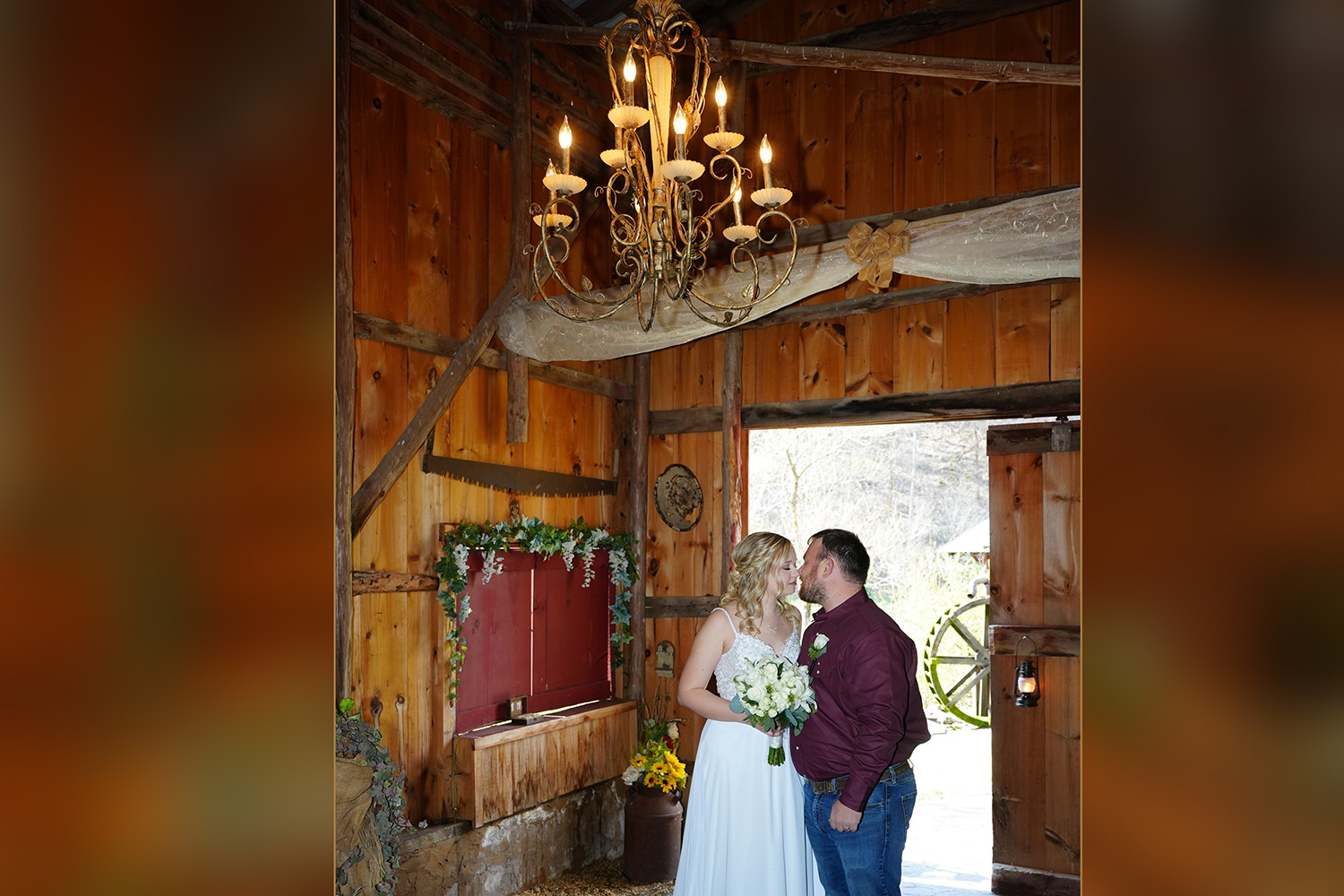 Chandelier Wedding Ceremony in a barn