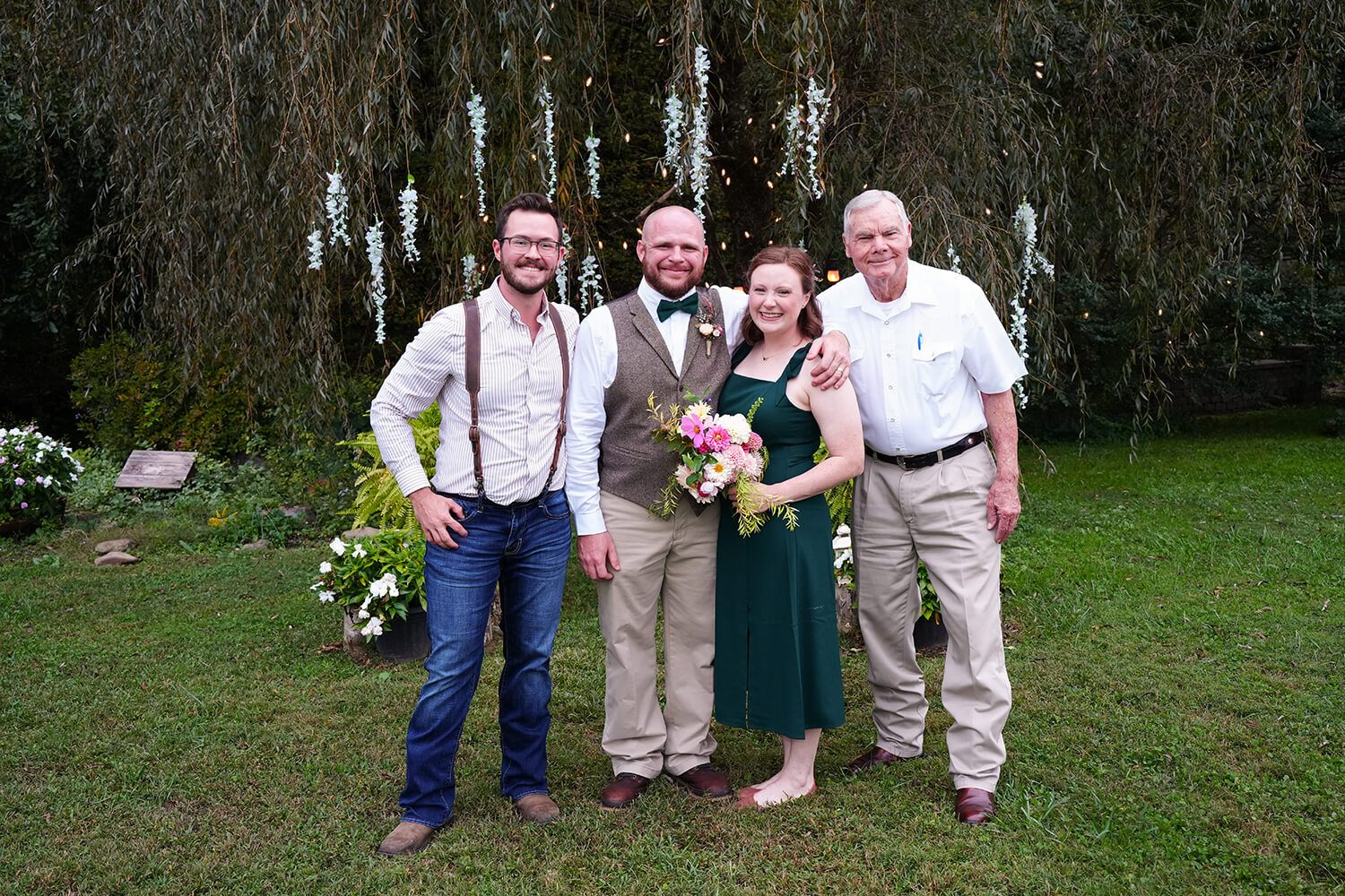 Small group of four getting married at the willow tree at Honeysuckle Hills in Pigeon Forge Tennessee